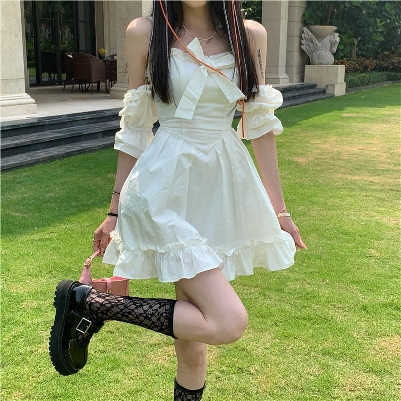 Cute white kawaii dress, perfect for a party or a beach shore. The off-the-shoulder style is flattering and sexy. This cute sundress has a bow accent on the straps, adding to the cuteness of this Kawaii dress.  Size Guide: Size S - Weight: 40 kg - 45 kg Size M - Weight: 45 kg - 50 kg Size L - Weight: 50 kg - 55 kg Size XL - Weight: 55kg-60 kg   Package Includes:  1 * White Kawaii Fairy Strap Dress