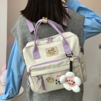 حقيبة ظهر على شكل زهرة من Kawai Harajuku بملصقات لطيفة على شكل حلقة وإبزيم على شكل زهرة هاراجوكو كاواي